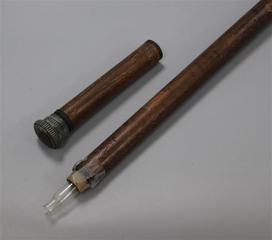 A gentlemans Malacca cane, with fitted spirit flask and glass, H.90cm